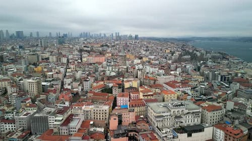 the Galata Tower, downtown and the Bosphorus in the background circle left