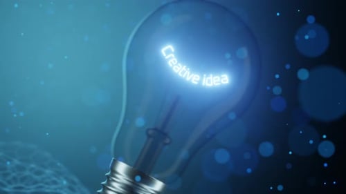 Shining inscription creative idea in a light bulb. Creative idea. Coming up with new marketing ideas