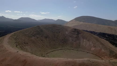 Nice aerial view flight
Volcano crater schlund lava field Lanzarote Canary Islands, sunny day Spain