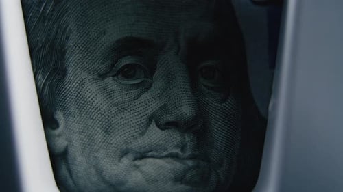 Hundred Dollar Banknote Lying in Paper Money Counting Machine