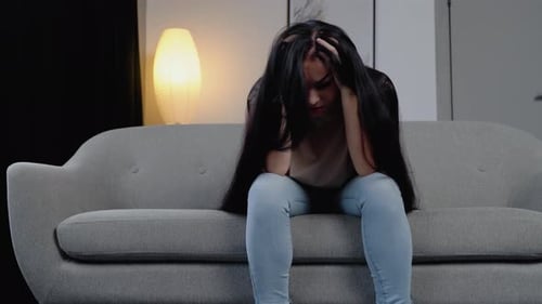 Sad Hopeless Young Woman Sit Alone at Home Feeling Desperate Depressed Upset Stressed Girl Suffer