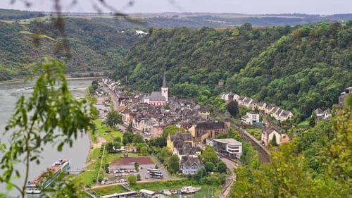 Small medieval European town of Sankt Goar on the Rhine River on an overcast summer day, Germany