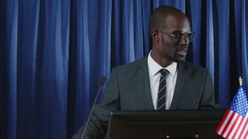 African American Government Official Holding Press Conference