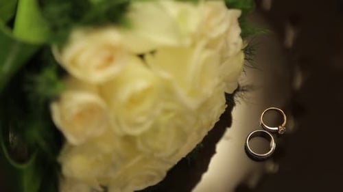 wedding ring and wedding bouquet