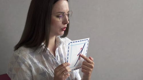 An elementary school teacher conducts an online lesson for children. Distance learning.