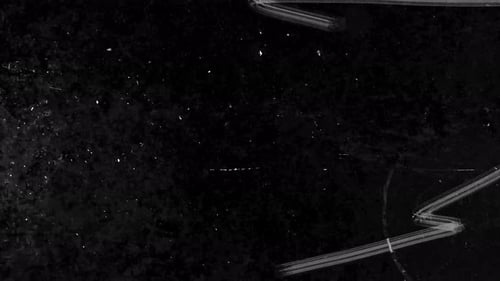 Film Burn Flash Transition with Grunge Dust