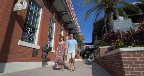 Tampa, Florida / United States - December 18 2018: Couple Walks Outside