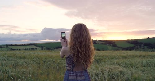 Travel, phone and selfie by woman in the countryside for memory, picture