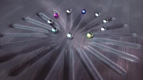 Background Featuring an Optical Illusion Where Balls Appear to Move in a Straight Line Forming a