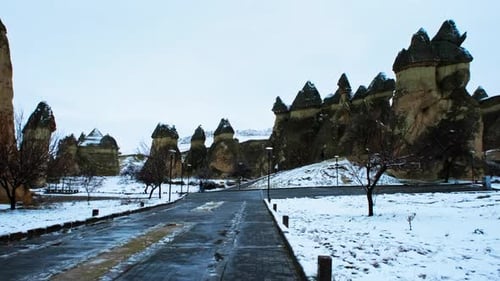 Fairy Chimneys And Snowy Road