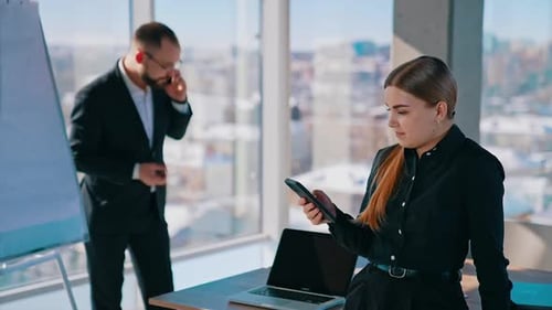 Businessman and secretary in office.