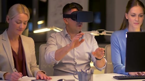 Business, Deadline and Technology Concept - Team with Virtual Reality Headset Working