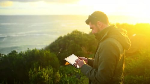 Nature, sunrise and man with tablet for photography for landscape, natural environment