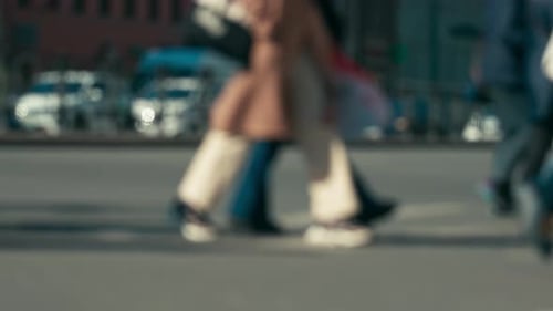 Blurry Legs of People Crossing the Road Crowds of Men and Women