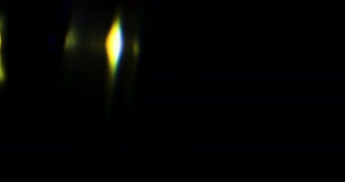 Beautiful, stunning light reflections and anamorphic blue streaks shot on black with high-end cinema