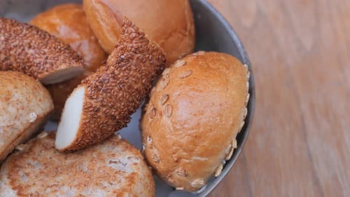 Freshly Baked Bread Rolls Warmly Served in a Bowl Ready for Enjoyment and Sharing