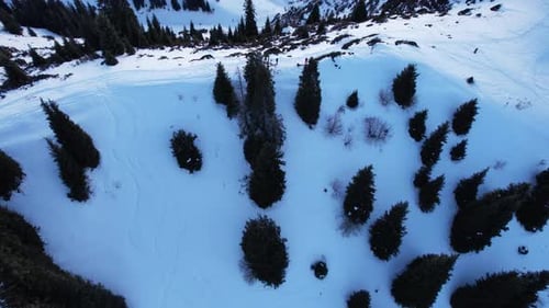 Epic Redorange Sunset in High Snowy Mountains
