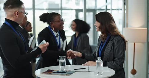 Business, people and handshake at corporate seminar with opportunity, onboarding or meeting