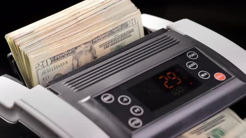 Money counting machine. Slow Motion.