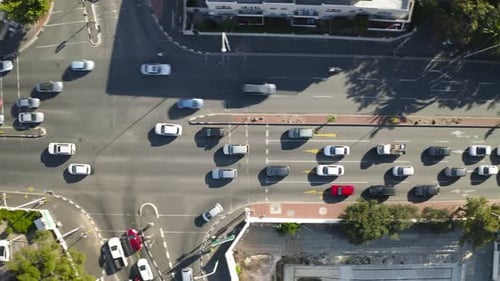 4k video footage of cars travelling on a road in a city