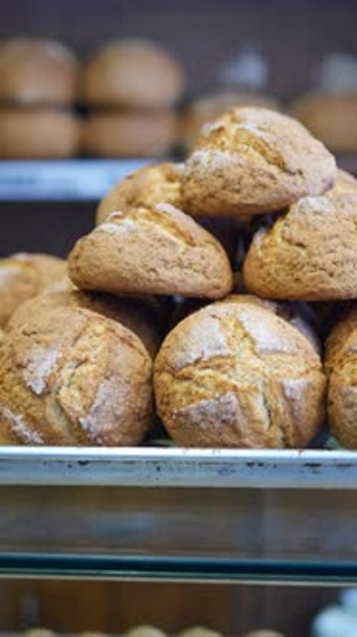 Freshly Baked Bread Rolls in Local Bakery Display