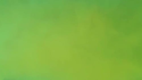 Abstract fog and mist motion background in lime green.