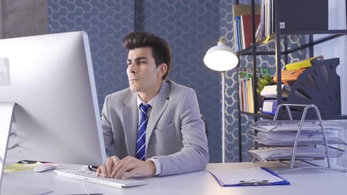 Thoughtful office worker.