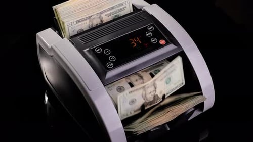 Money counting machine. Slow Motion.