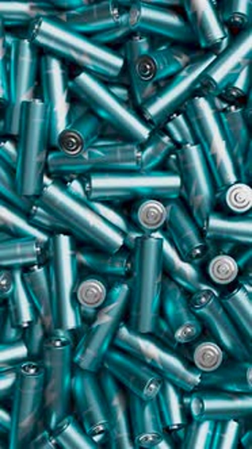 Tracking Shot Over Large Pack of Blue Batteries with Soft Focus Environment Conservation Concept 3d