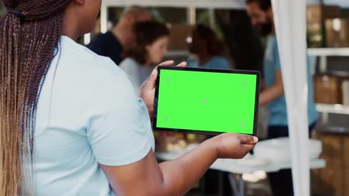 Lady Holds Tablet with Mockup Template