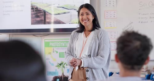 Teacher, education and woman answer question of children in classroom, study and knowledge