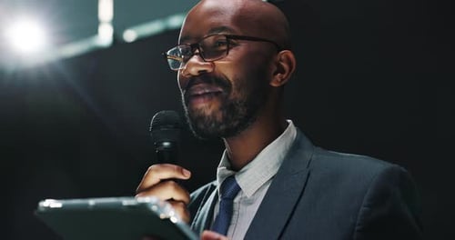 Black man, meeting and tablet at seminar for presentation, speech or discussion at workplace