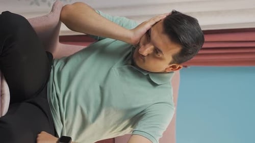 Vertical video of The grieving man is thinking and suffering from depression.