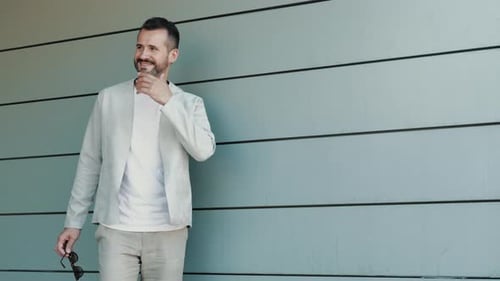 Handsome man posing outdoors