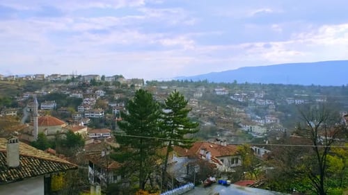 Old Houses And Clouds In The Sky