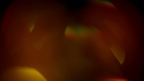 Multicolored Light Leaks Footage on Black Background Stylizing Video Transitions Bokeh Effect