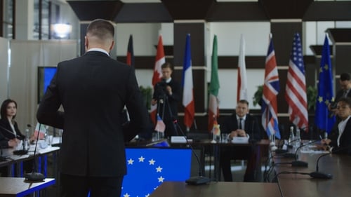 Politicians Listening To Member Speech