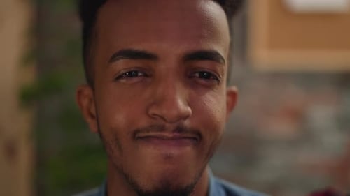 Handsome Young AfricanAmerican Man with Mustache and Beard