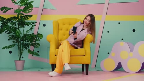 Woman Enjoys Online Talk On Mobile Phone