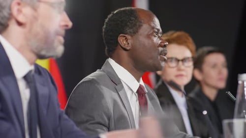 African American Diplomat Holding Speech at Press Conference