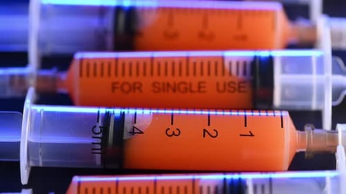 Medical Syringes and Medical Ampoules for Vaccination on the Table