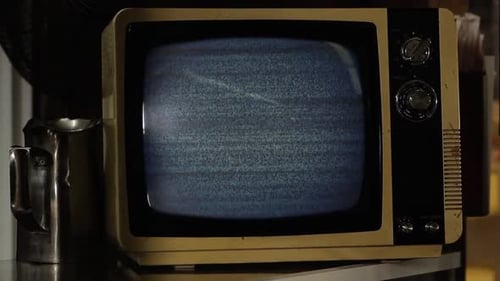 Old TV Set Turning On and Off Noise and Static On Screen.