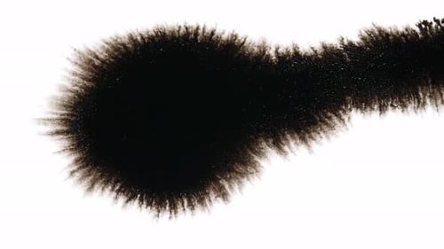 Black Ink Drops On White Background