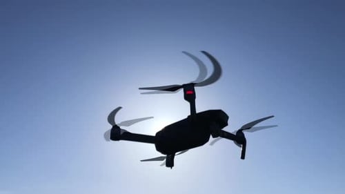 Drone Flying in the Sky Small Quadcopter