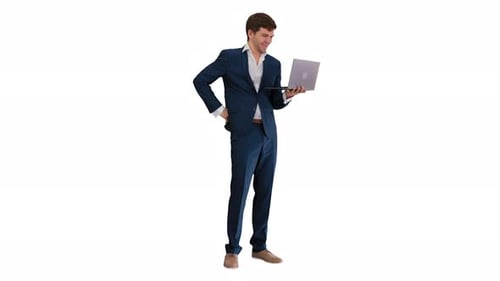 Smiling Young Businessman Using Laptop While Standing on White Background