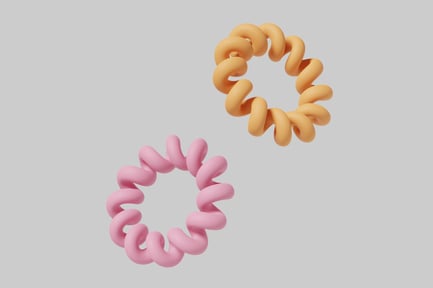 Two curly hair ties